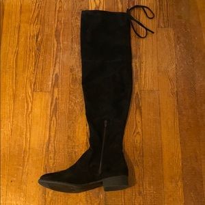 Over the knee black faux suede boots with ties.